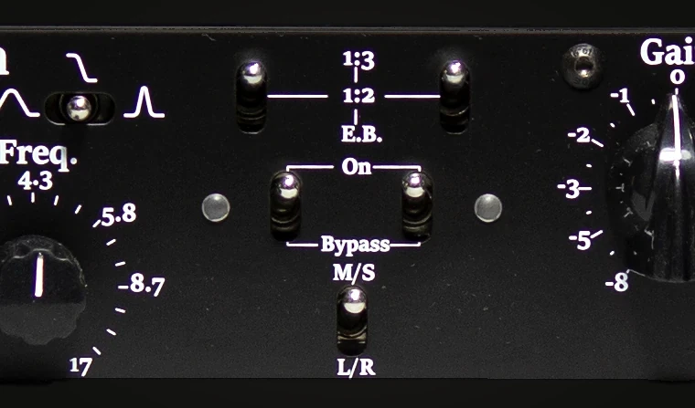 Centre section of the 554 Biquad front panel: two output selectors (1:3, 1:2, E.B.), two On/Bypass switches with indicators, and the L/R–M/S switch