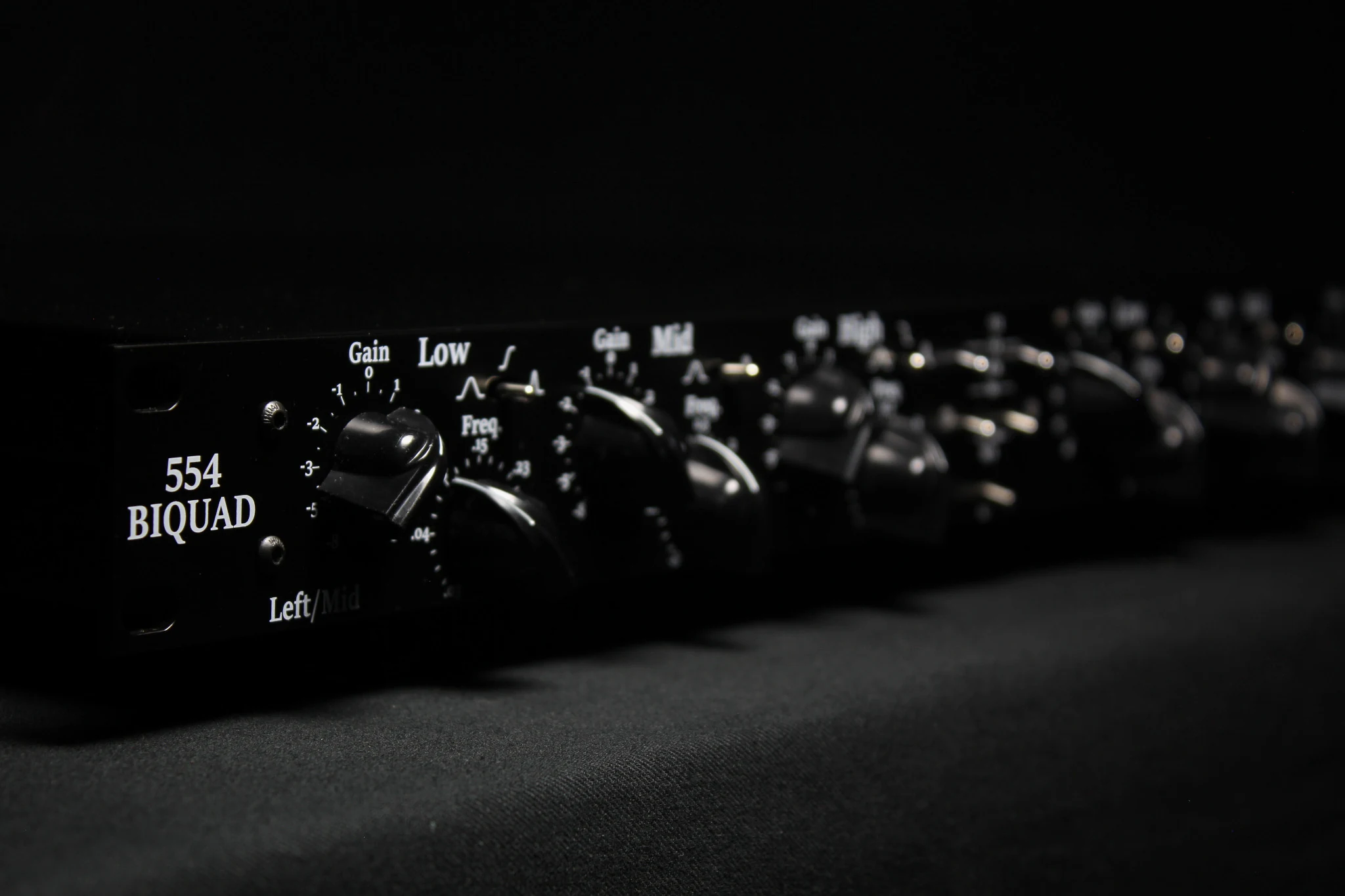 Armon 554 Biquad photographed in low light from a three-quarter angle