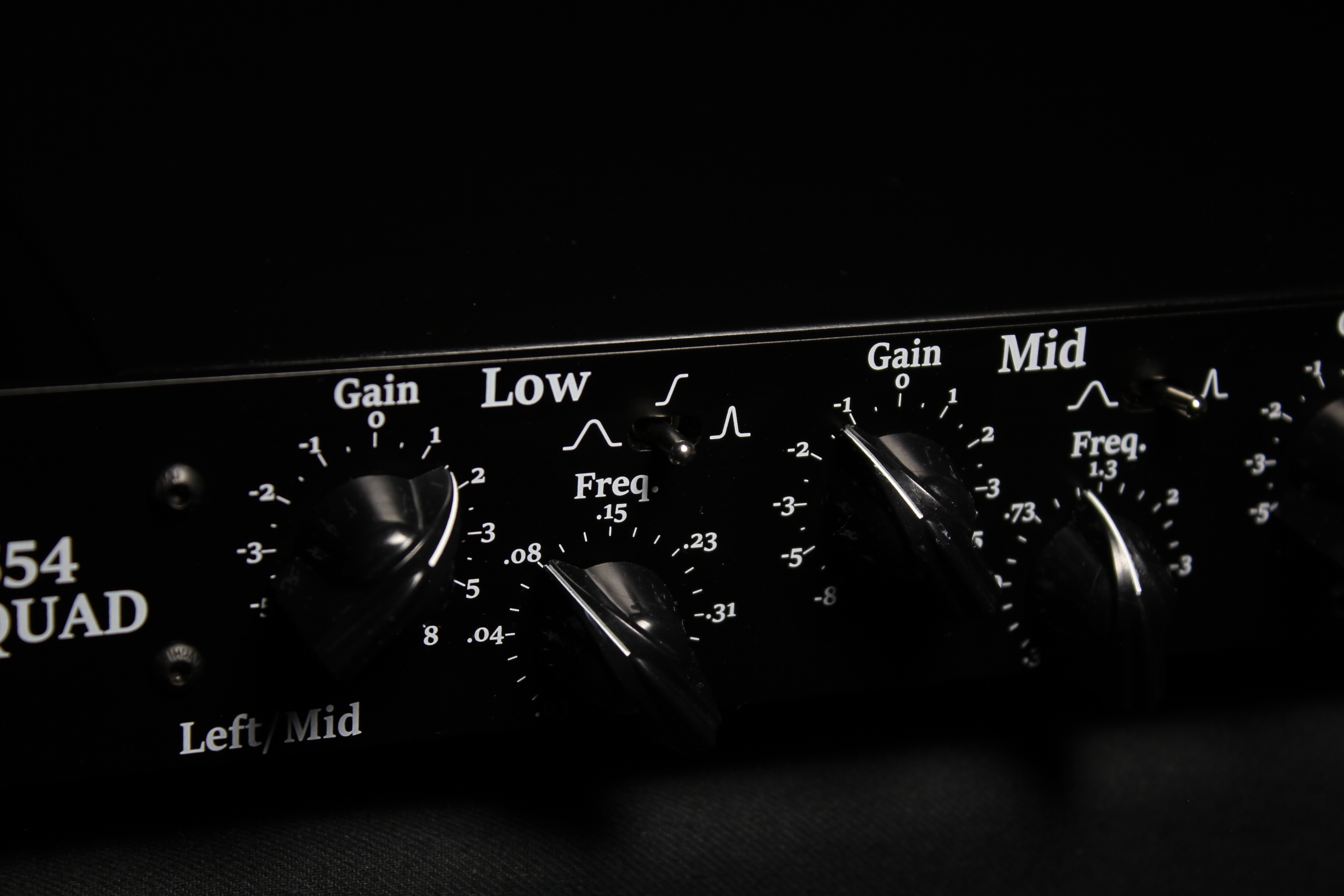 Close-up of the Left/Mid Low band controls and the beginning of the Mid band